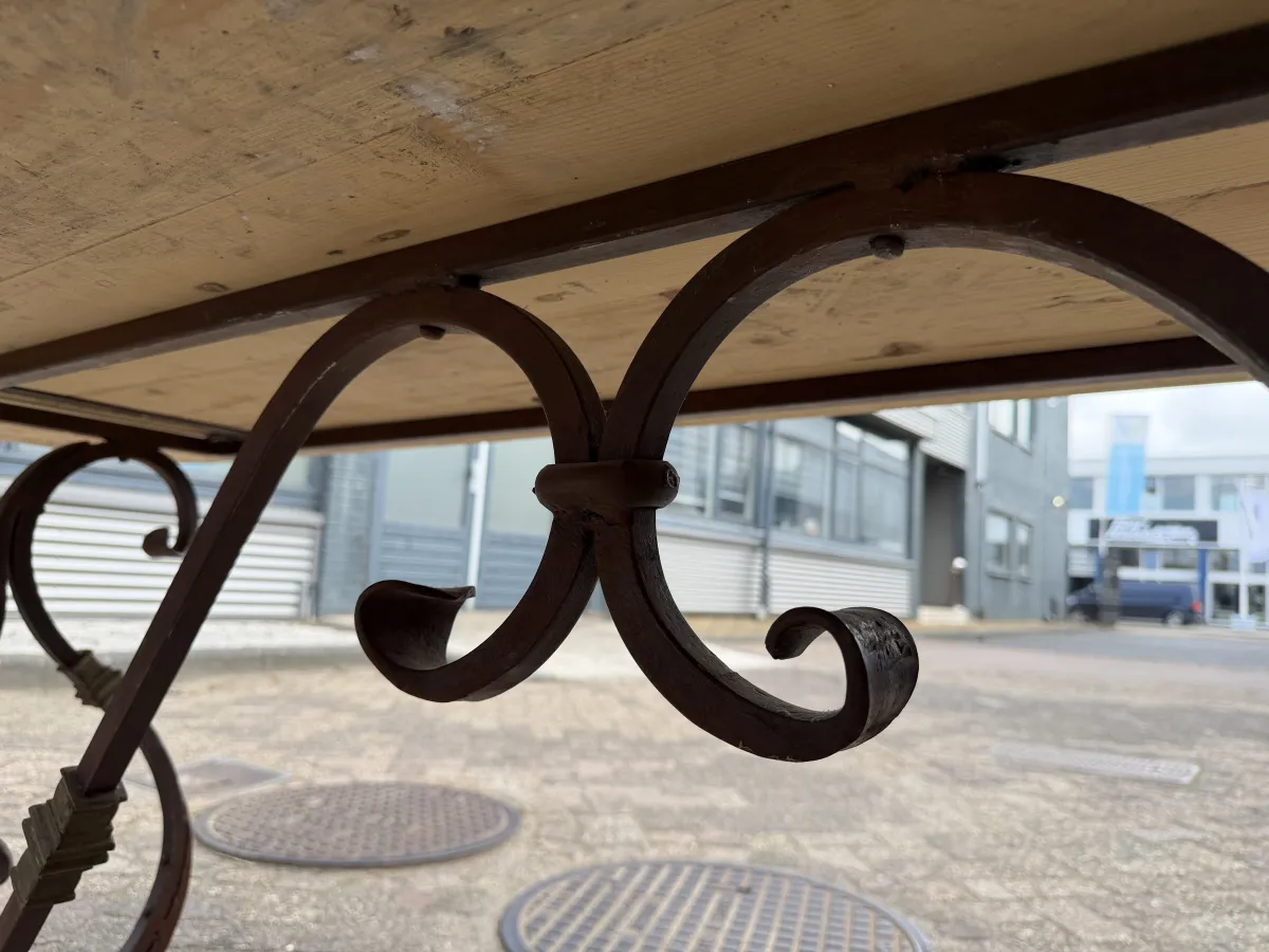 RENÉ HOUTMAN Rustic Whitewashed Solid Wood Dining Table with Ornate Wrought Iron Base