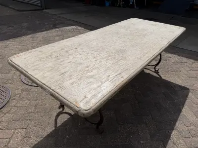 RENÉ HOUTMAN Rustic Whitewashed Solid Wood Dining Table with Ornate Wrought Iron Base