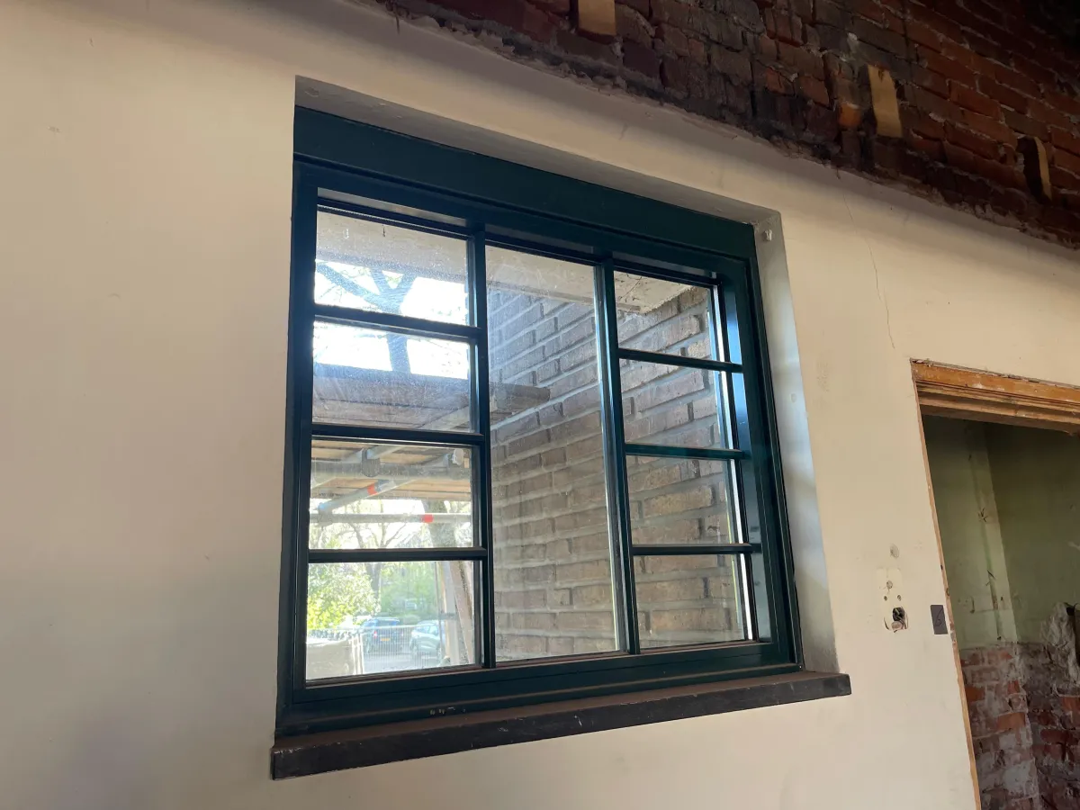 Dark Green Aluminium Multi-Pane Windows with Glazing Bars