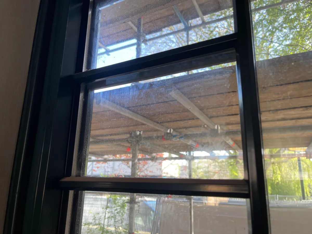 Dark Green Aluminium Multi-Pane Windows with Glazing Bars