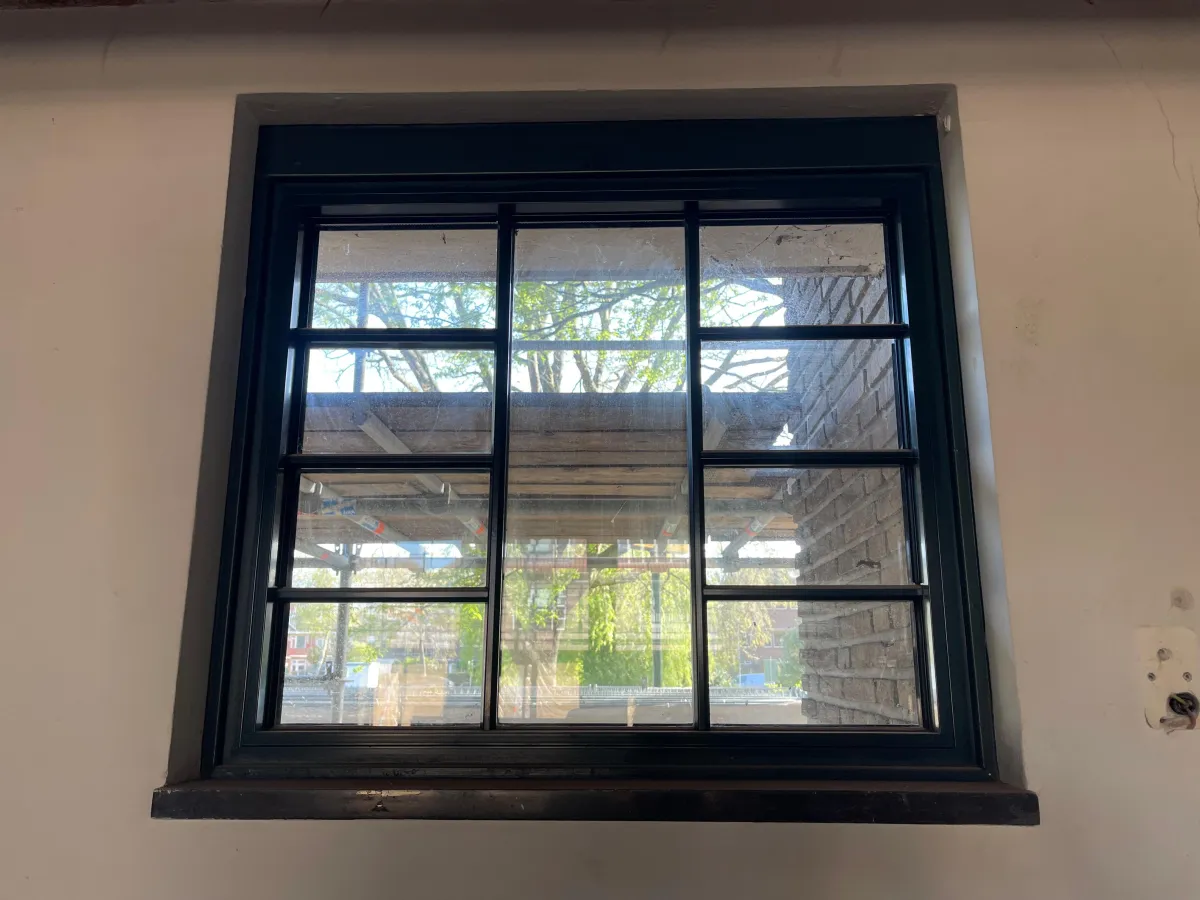 Dark Green Aluminium Multi-Pane Windows with Glazing Bars