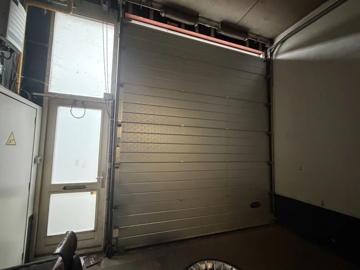 Industrial Sectional Overhead Garage Door with Wicket Door - Grey Steel, Large Format
