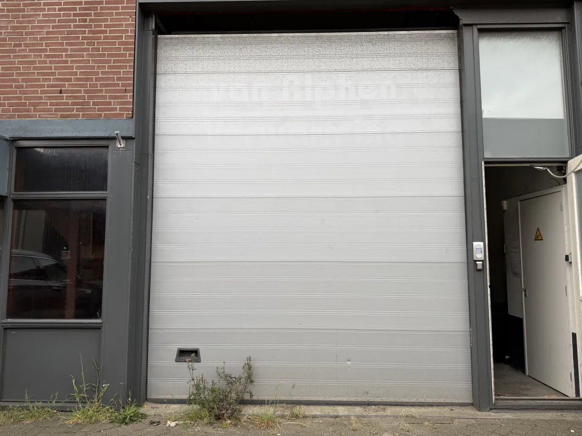 Industrial Sectional Overhead Garage Door with Wicket Door - Grey Steel, Large Format