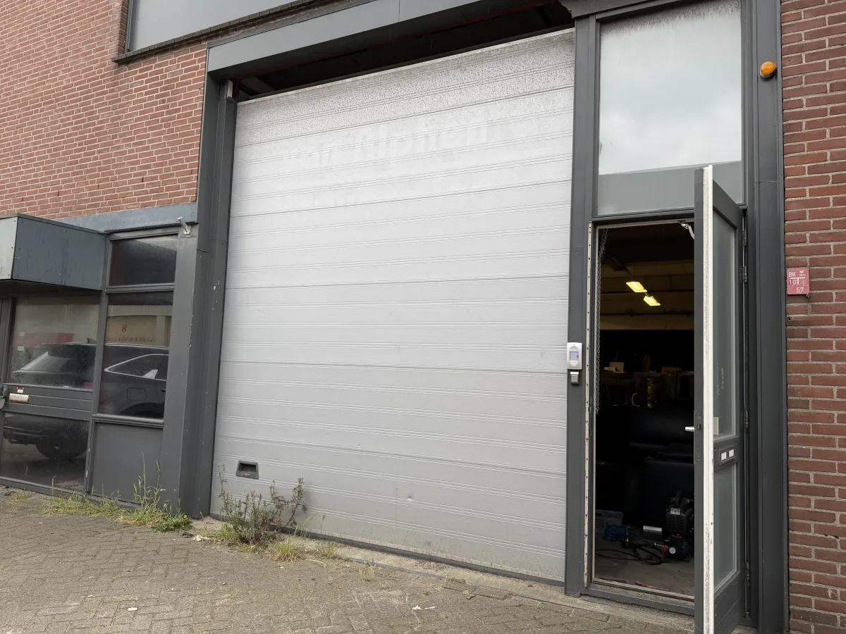 Industrial Sectional Overhead Garage Door with Wicket Door - Grey Steel, Large Format