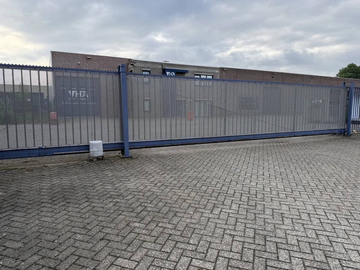 Heavy-Duty Blue Steel Sliding Gate with Anti-Climb Spikes – Approx. 8m Wide