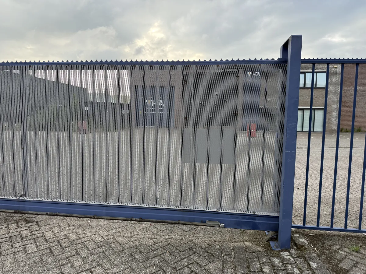 Heavy-Duty Blue Steel Sliding Gate with Anti-Climb Spikes – Approx. 8m Wide