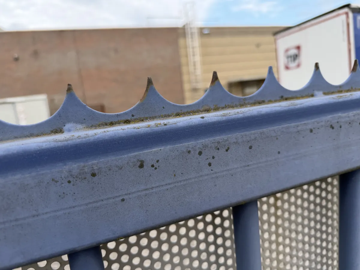 Heavy-Duty Blue Steel Sliding Gate with Anti-Climb Spikes – Approx. 8m Wide