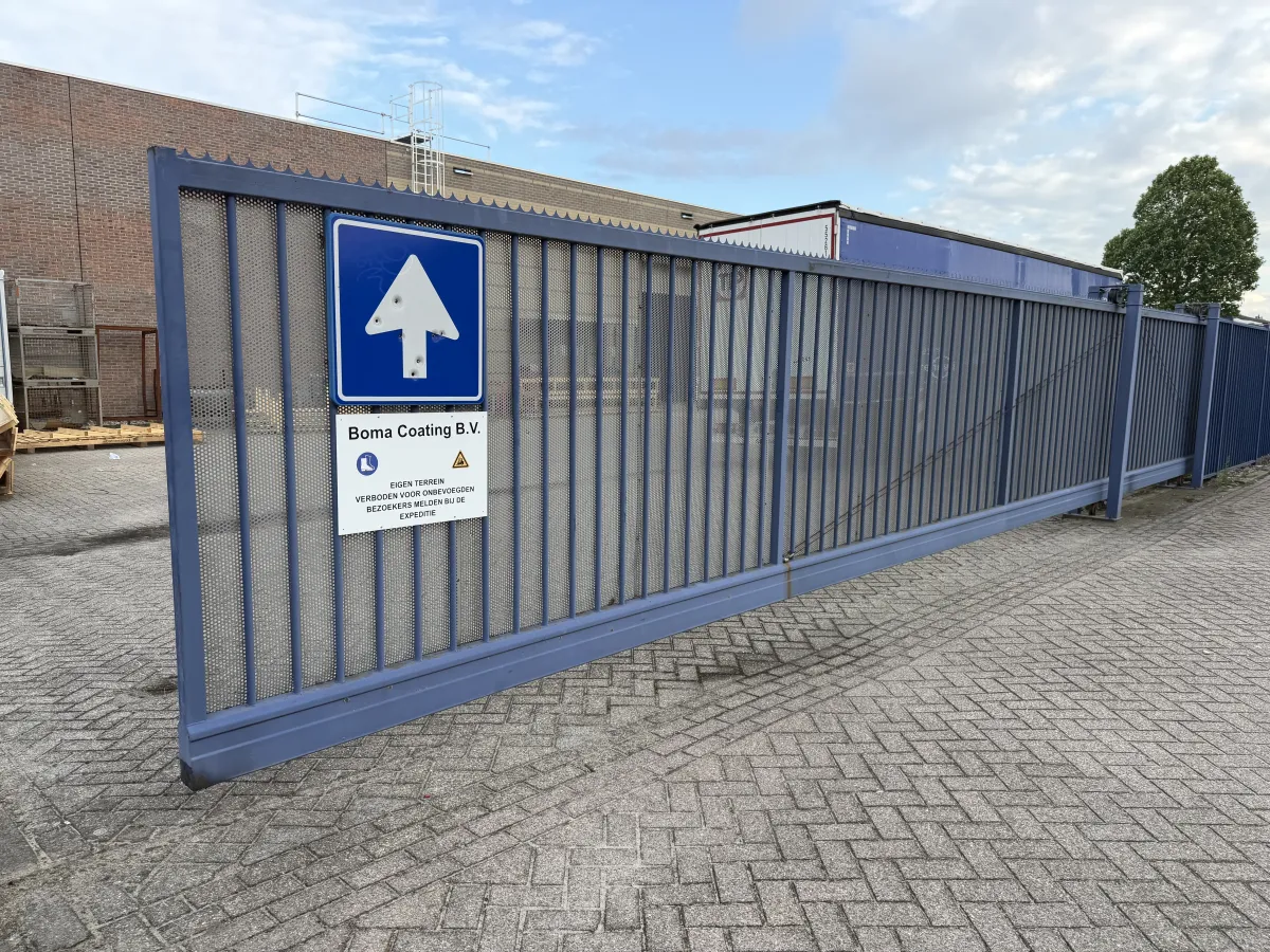 Heavy-Duty Blue Steel Sliding Gate with Anti-Climb Spikes – Approx. 8m Wide