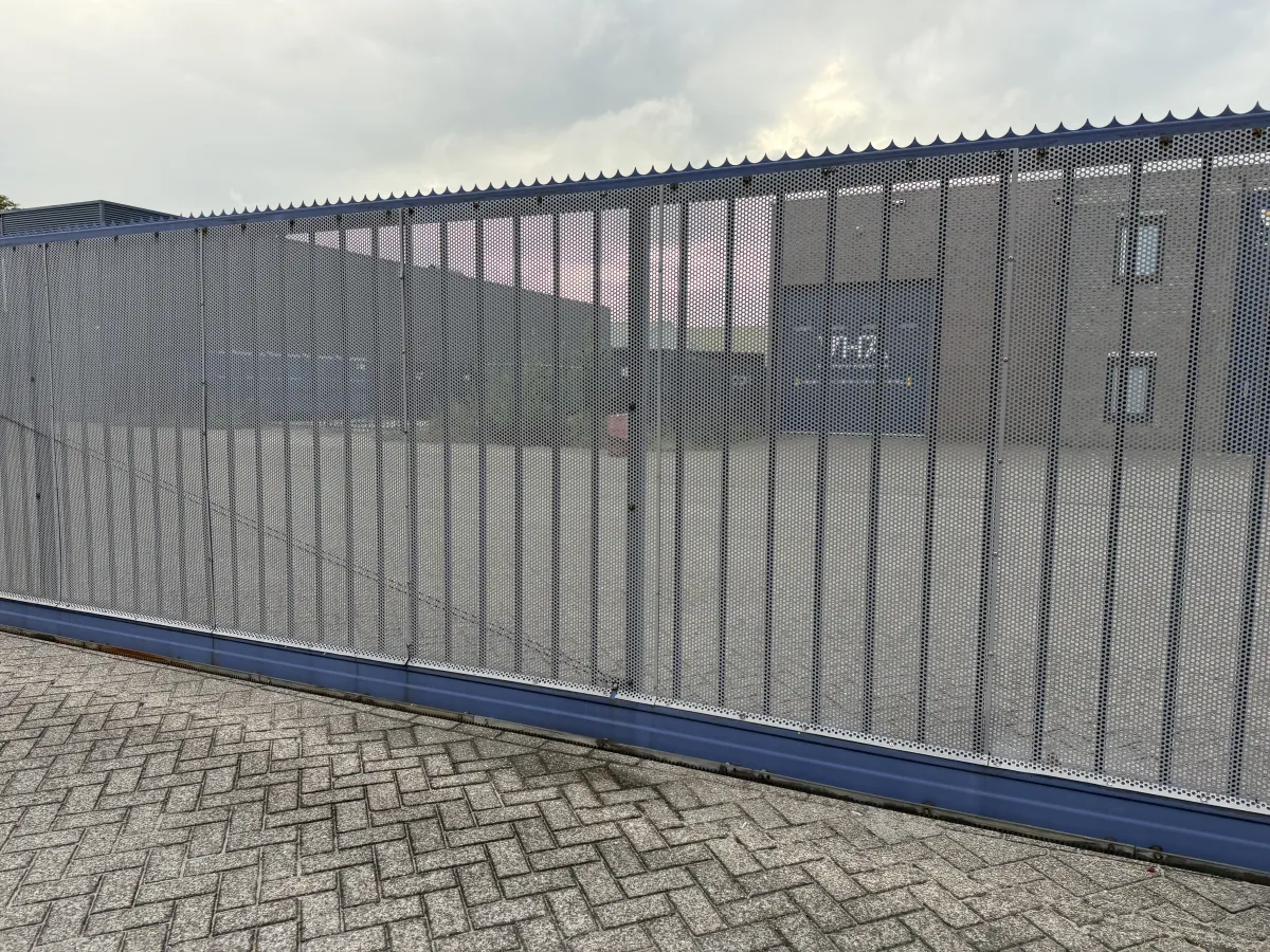 Heavy-Duty Blue Steel Sliding Gate with Anti-Climb Spikes – Approx. 8m Wide