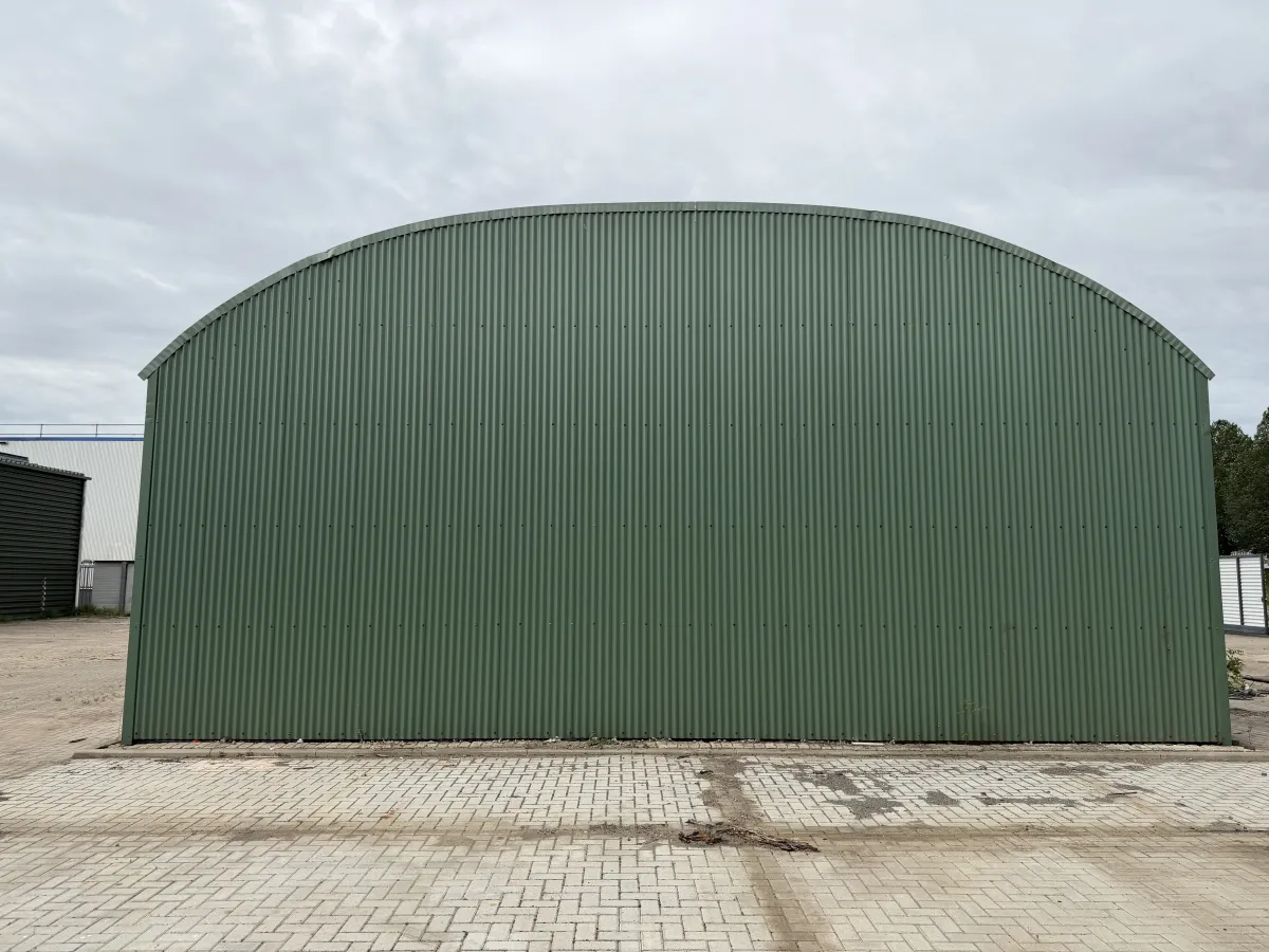 Used Steel Romney Structure with Timber Purlins & Corrugated Roof Sheets (110 m2)