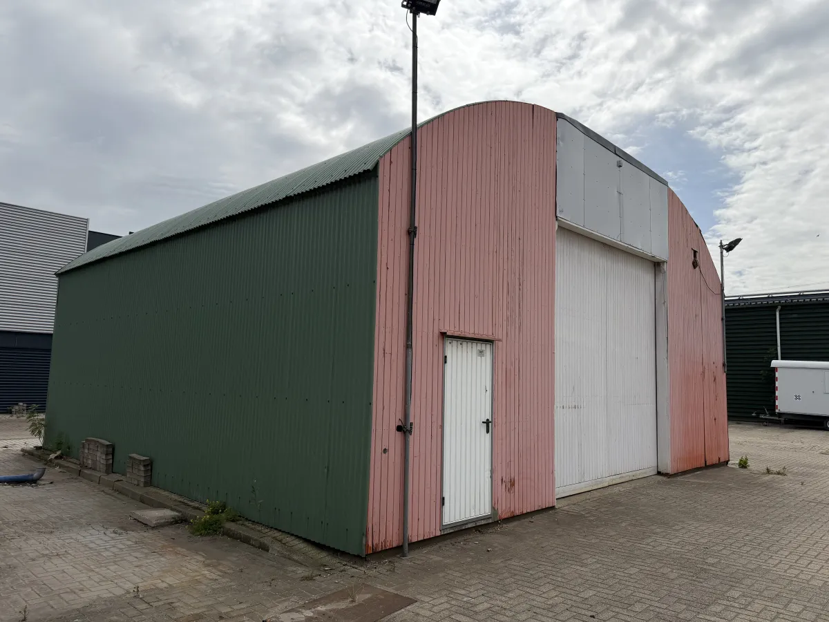 Used Steel Romney Structure with Timber Purlins & Corrugated Roof Sheets (110 m2)