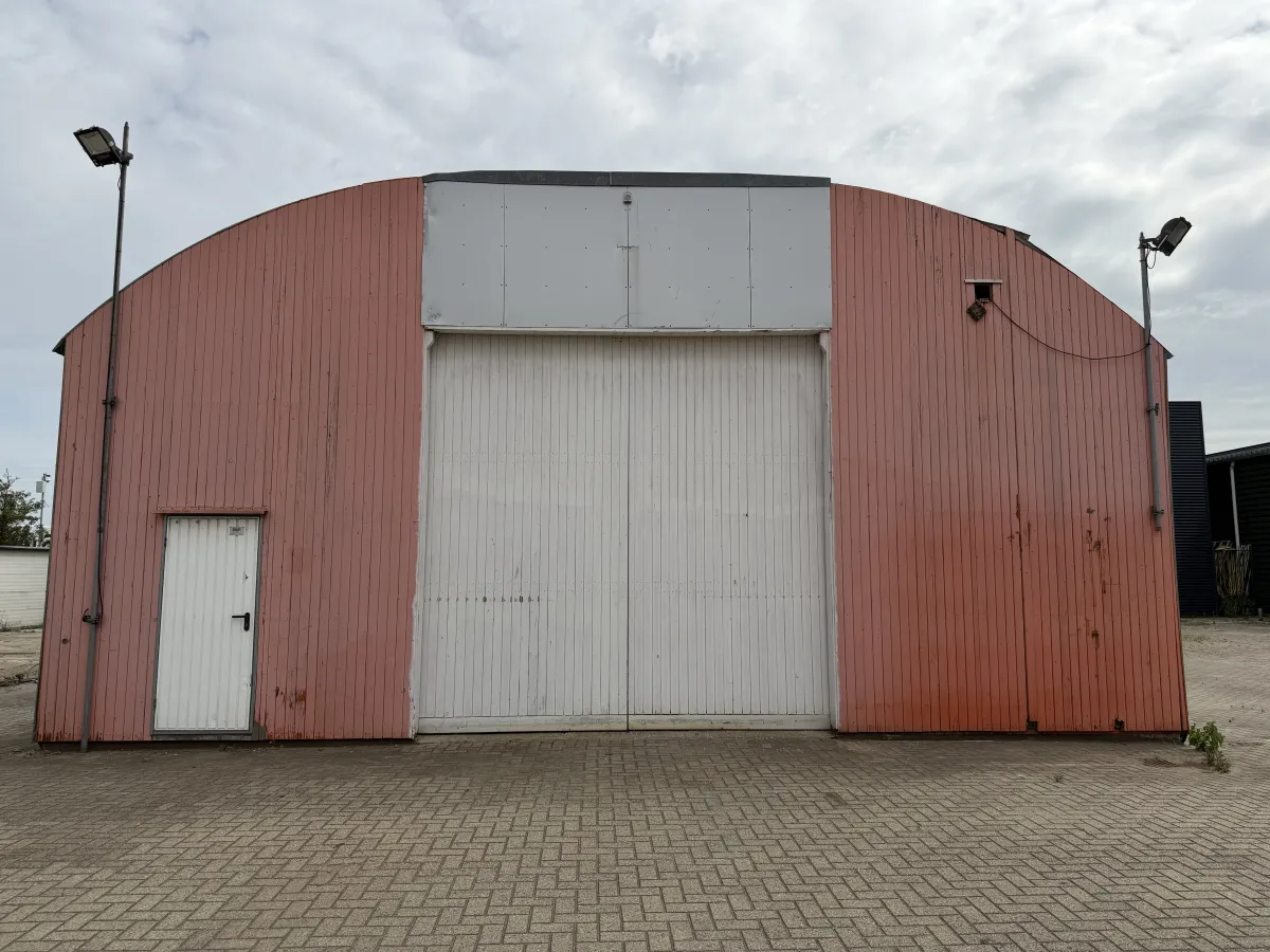 Used Steel Romney Structure with Timber Purlins & Corrugated Roof Sheets (110 m2)