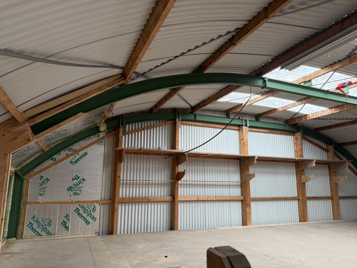 Used Steel Romney Structure with Timber Purlins & Corrugated Roof Sheets (110 m2)
