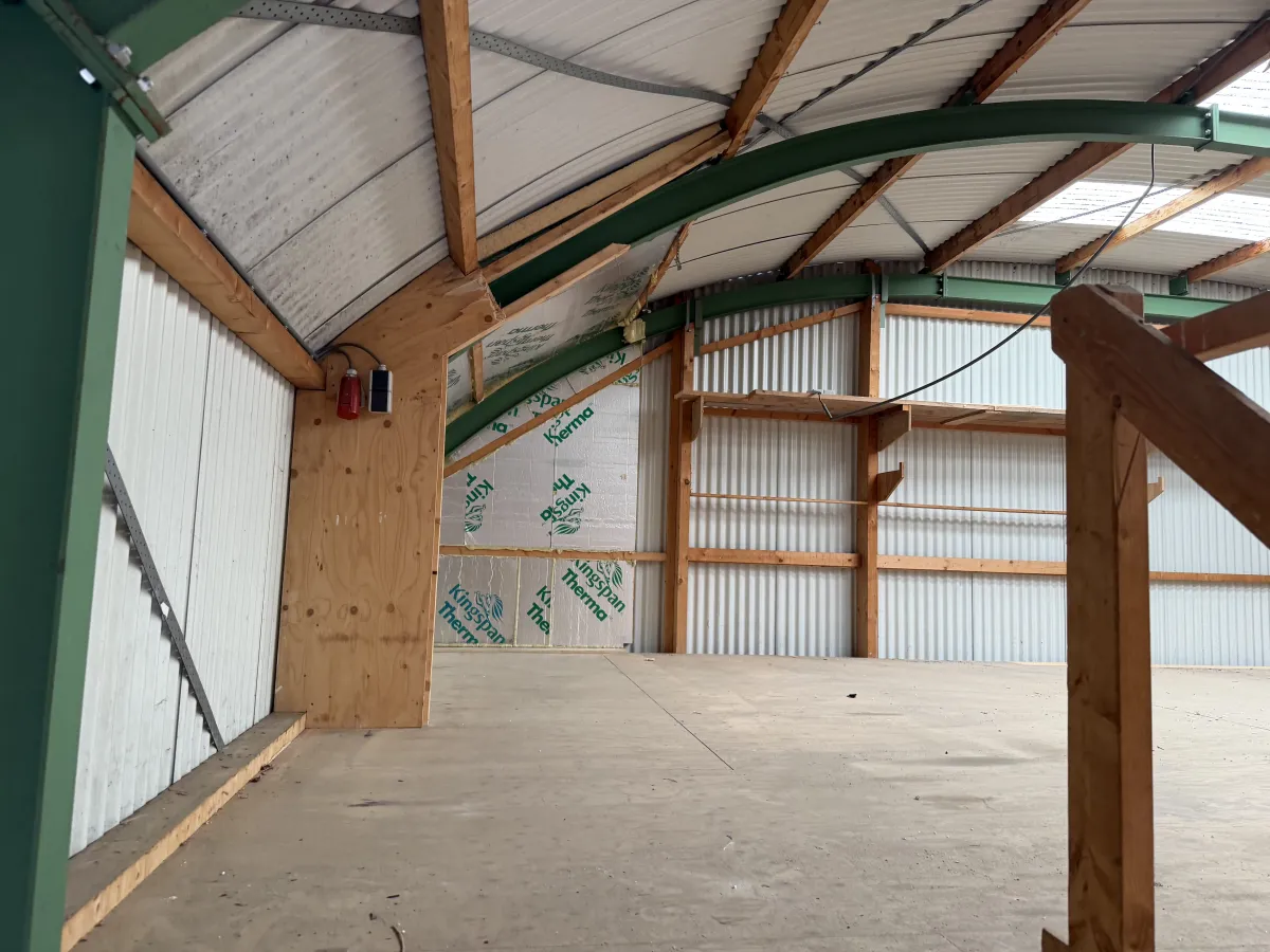 Used Steel Romney Structure with Timber Purlins & Corrugated Roof Sheets (110 m2)