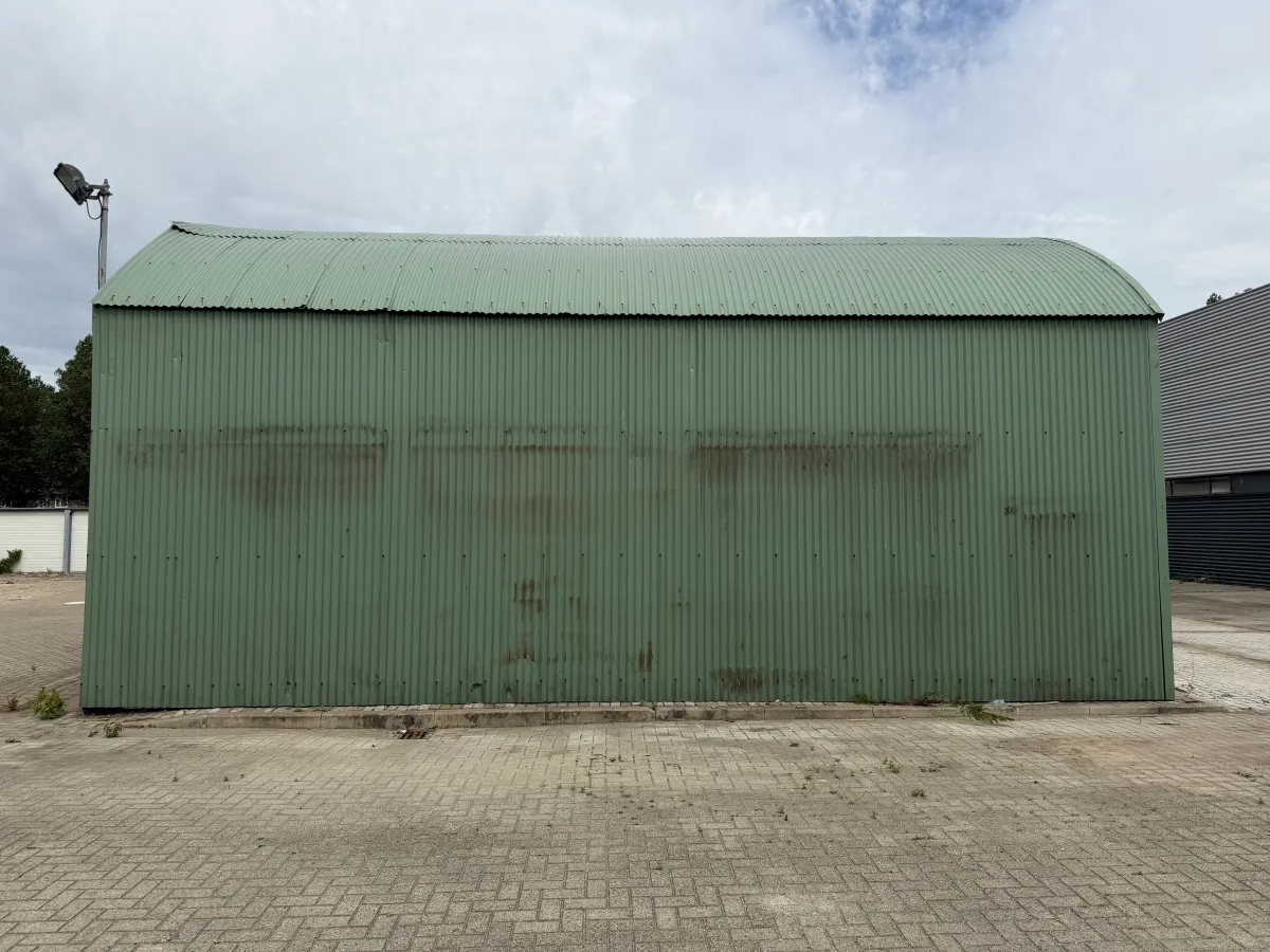 Used Steel Romney Structure with Timber Purlins & Corrugated Roof Sheets (110 m2)