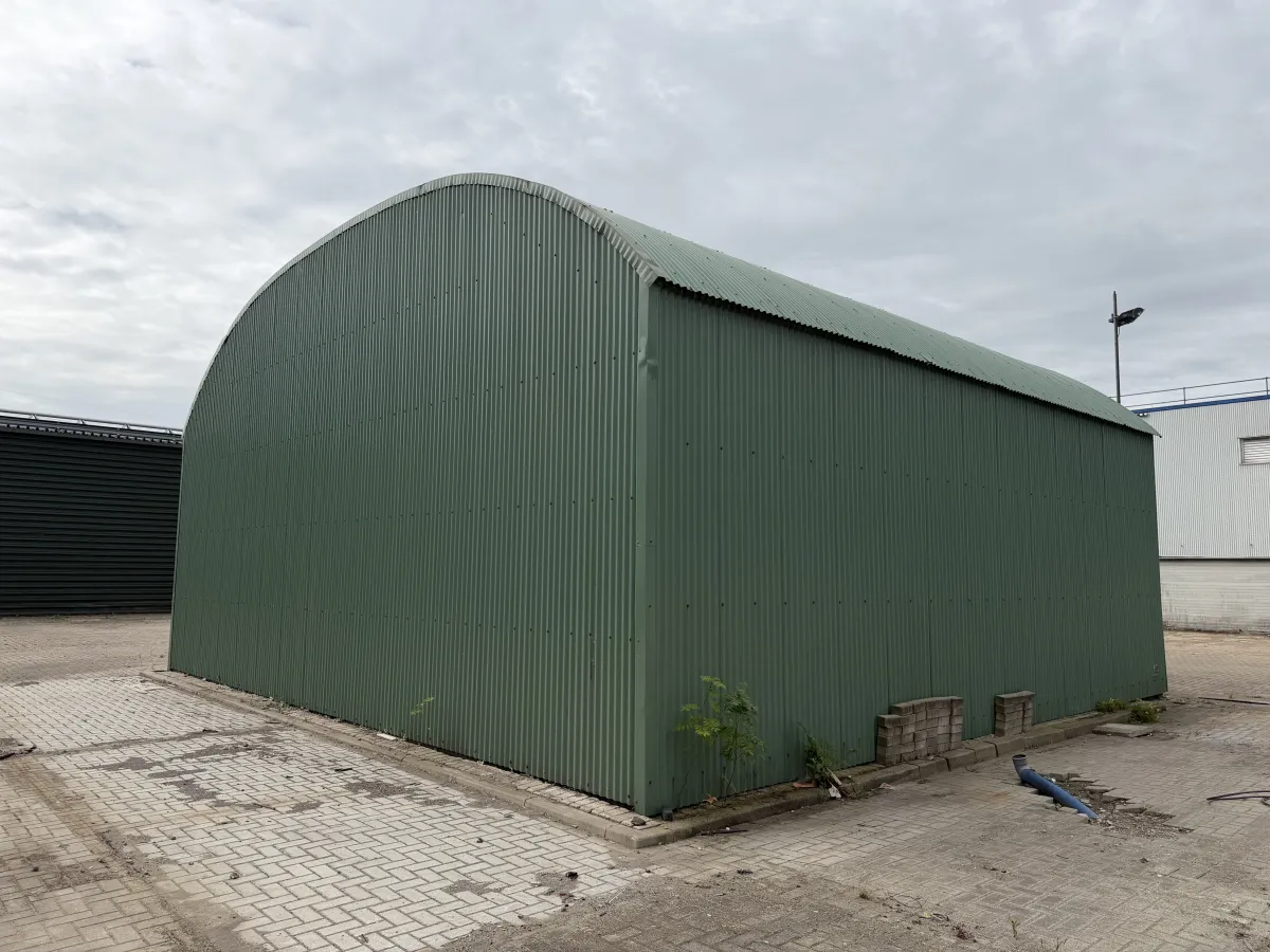 Used Steel Romney Structure with Timber Purlins & Corrugated Roof Sheets (110 m2)