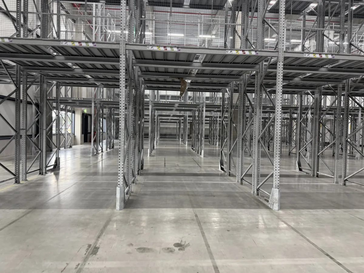 Multi-Tier Steel Mezzanine Racking System – Large Warehouse Installation,