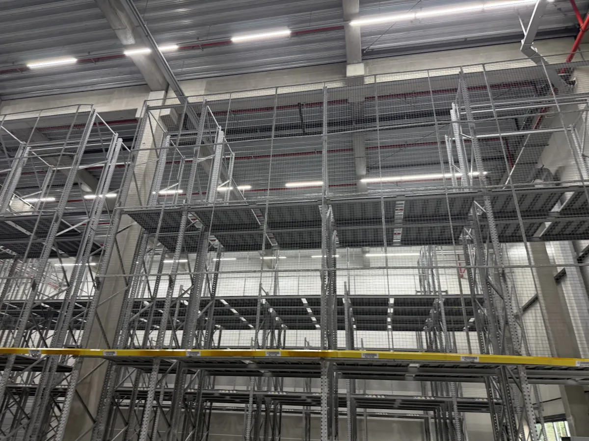 Multi-Tier Steel Mezzanine Racking System – Large Warehouse Installation,