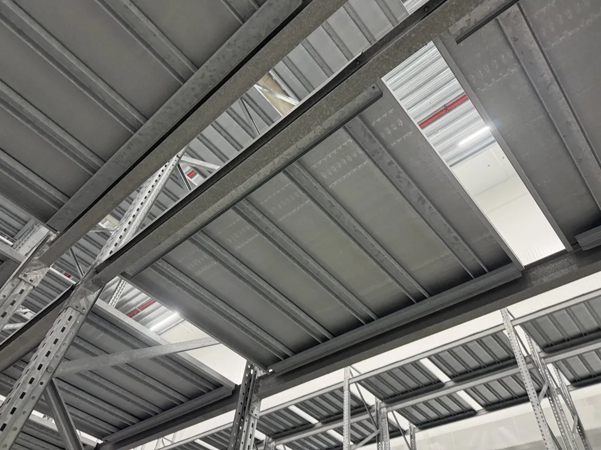 Multi-Tier Steel Mezzanine Racking System – Large Warehouse Installation,