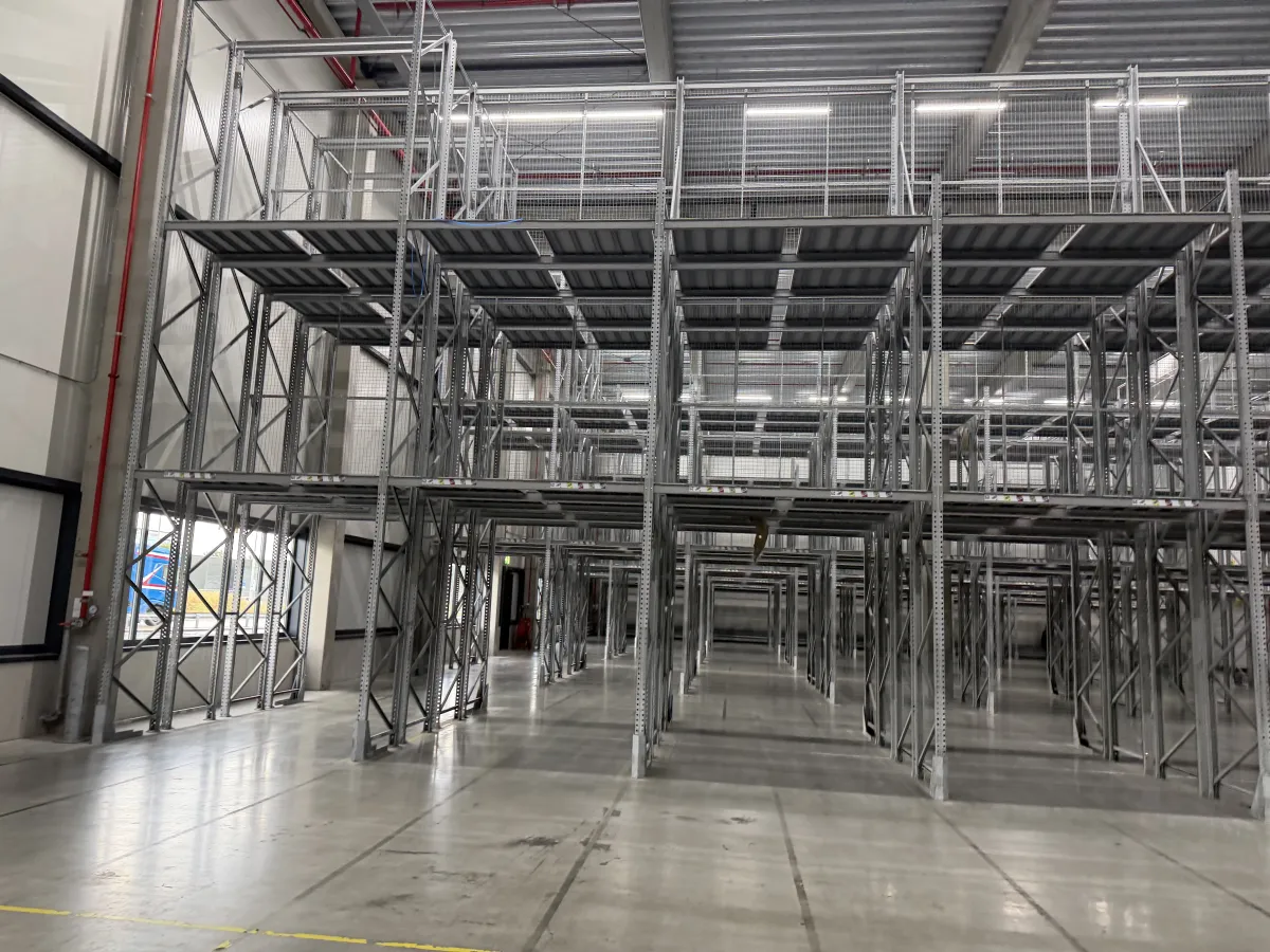 Multi-Tier Steel Mezzanine Racking System – Large Warehouse Installation,