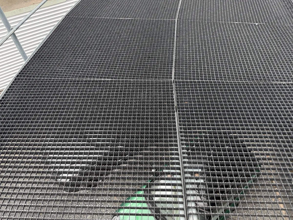 Steel Roof Structure with Corrugated Deck, LED Strip Lights & Glazed Curtain Wall Canopy