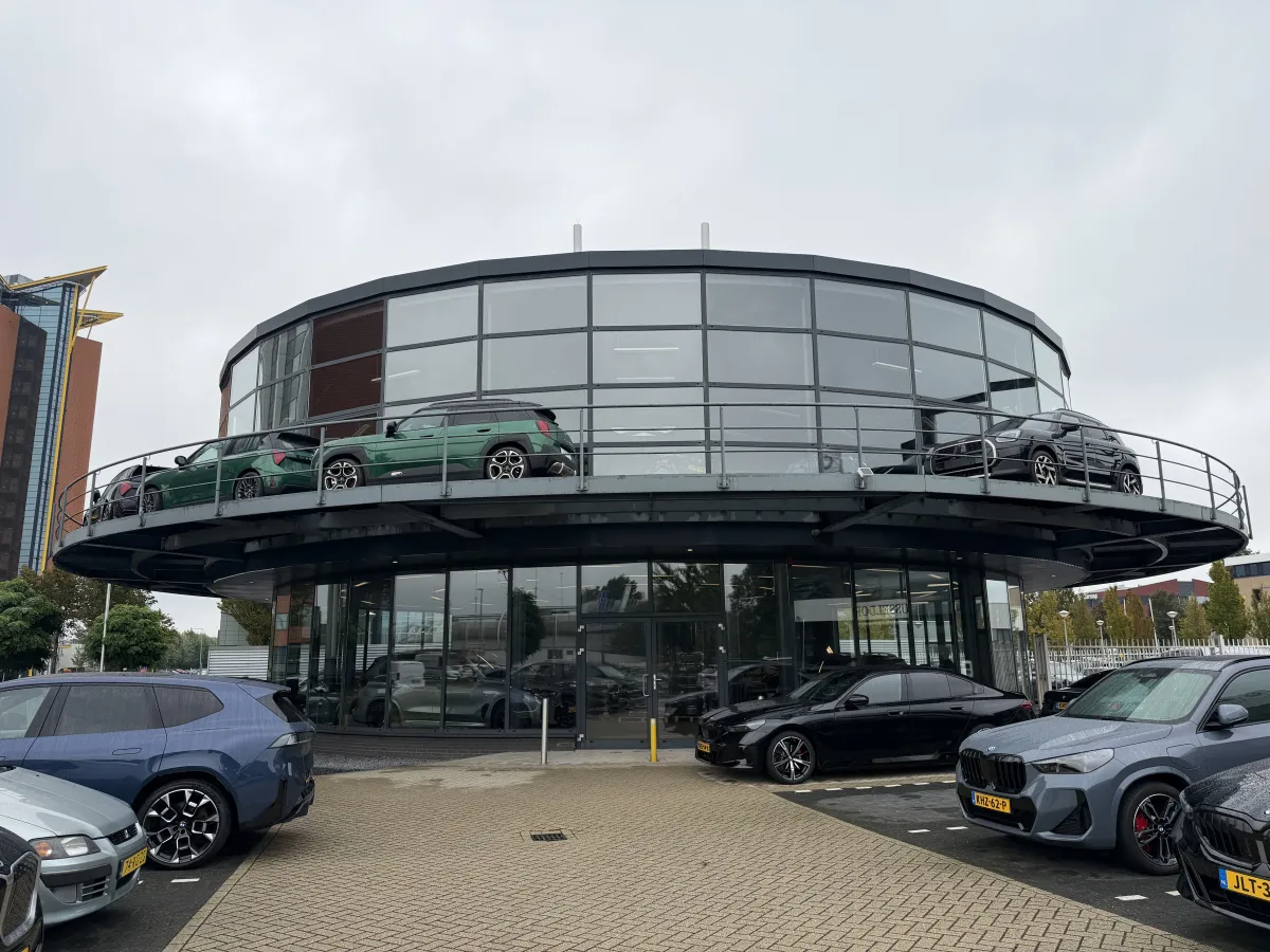 Steel Roof Structure with Corrugated Deck, LED Strip Lights & Glazed Curtain Wall Canopy