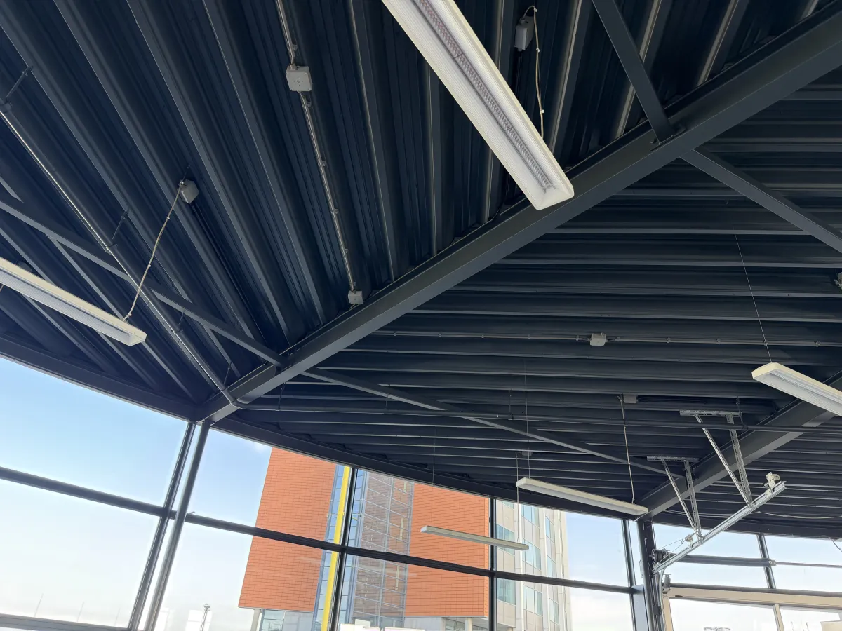 Steel Roof Structure with Corrugated Deck, LED Strip Lights & Glazed Curtain Wall Canopy