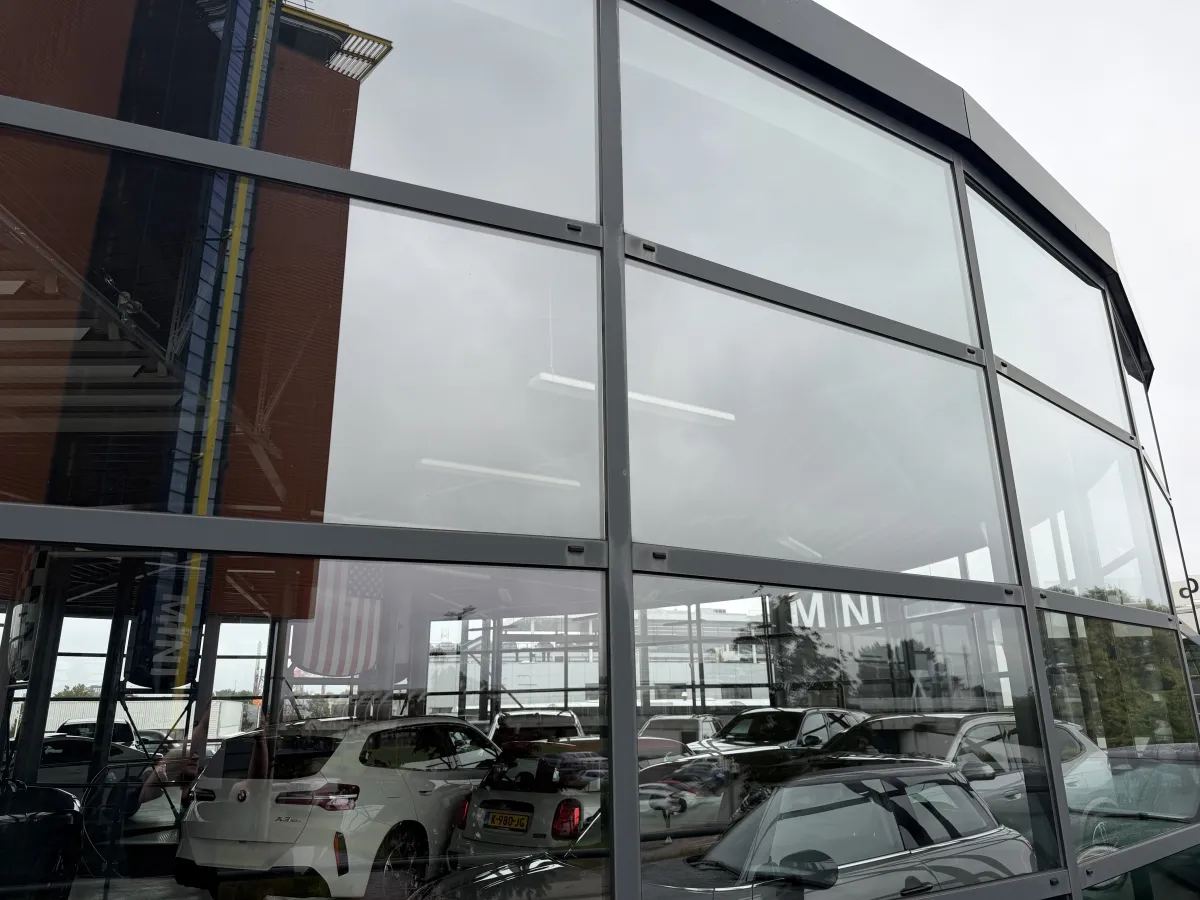 Steel Roof Structure with Corrugated Deck, LED Strip Lights & Glazed Curtain Wall Canopy
