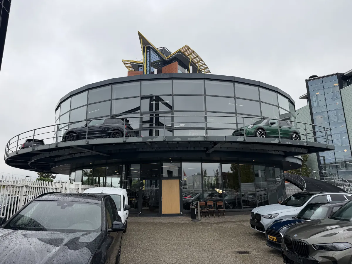 Steel Roof Structure with Corrugated Deck, LED Strip Lights & Glazed Curtain Wall Canopy