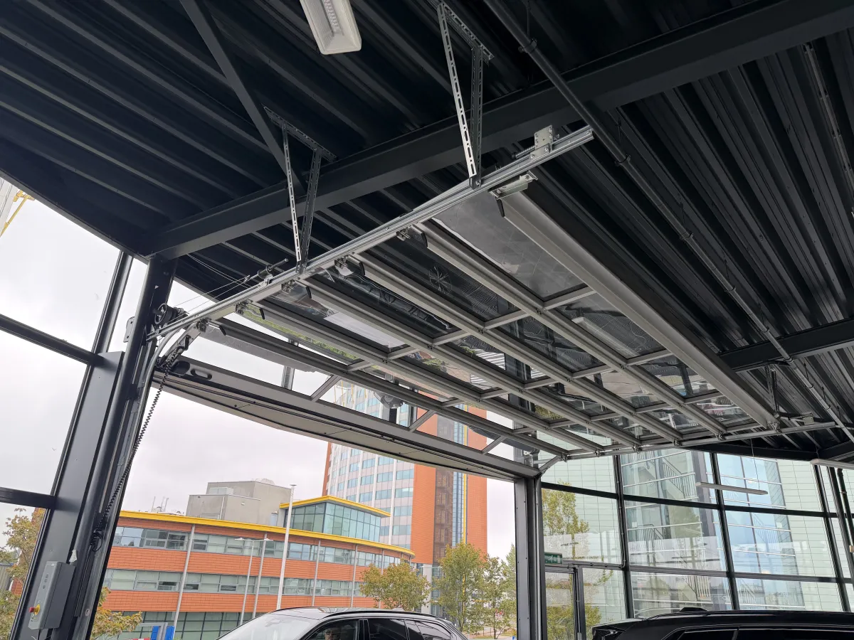 Steel Roof Structure with Corrugated Deck, LED Strip Lights & Glazed Curtain Wall Canopy