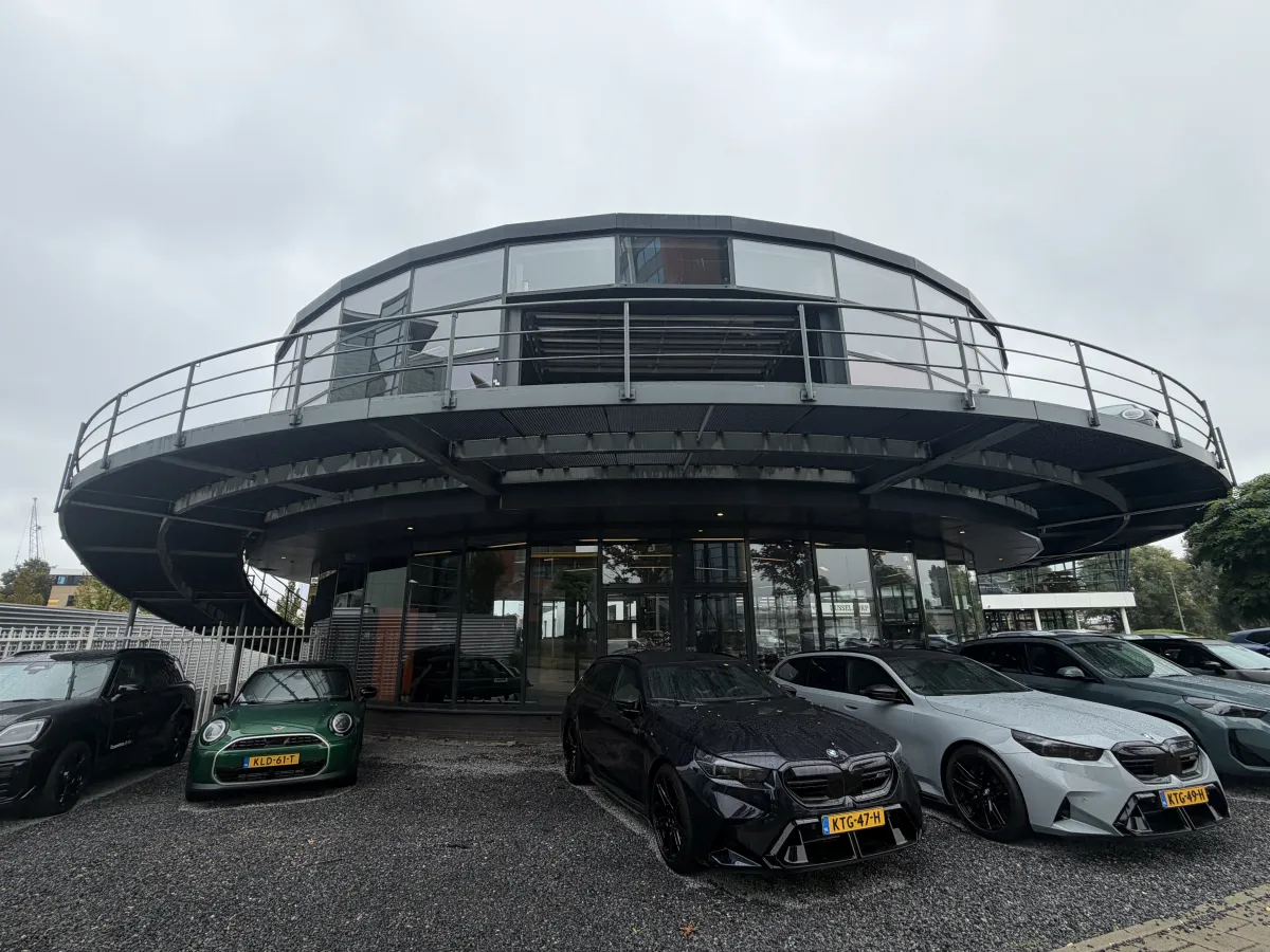 Steel Roof Structure with Corrugated Deck, LED Strip Lights & Glazed Curtain Wall Canopy