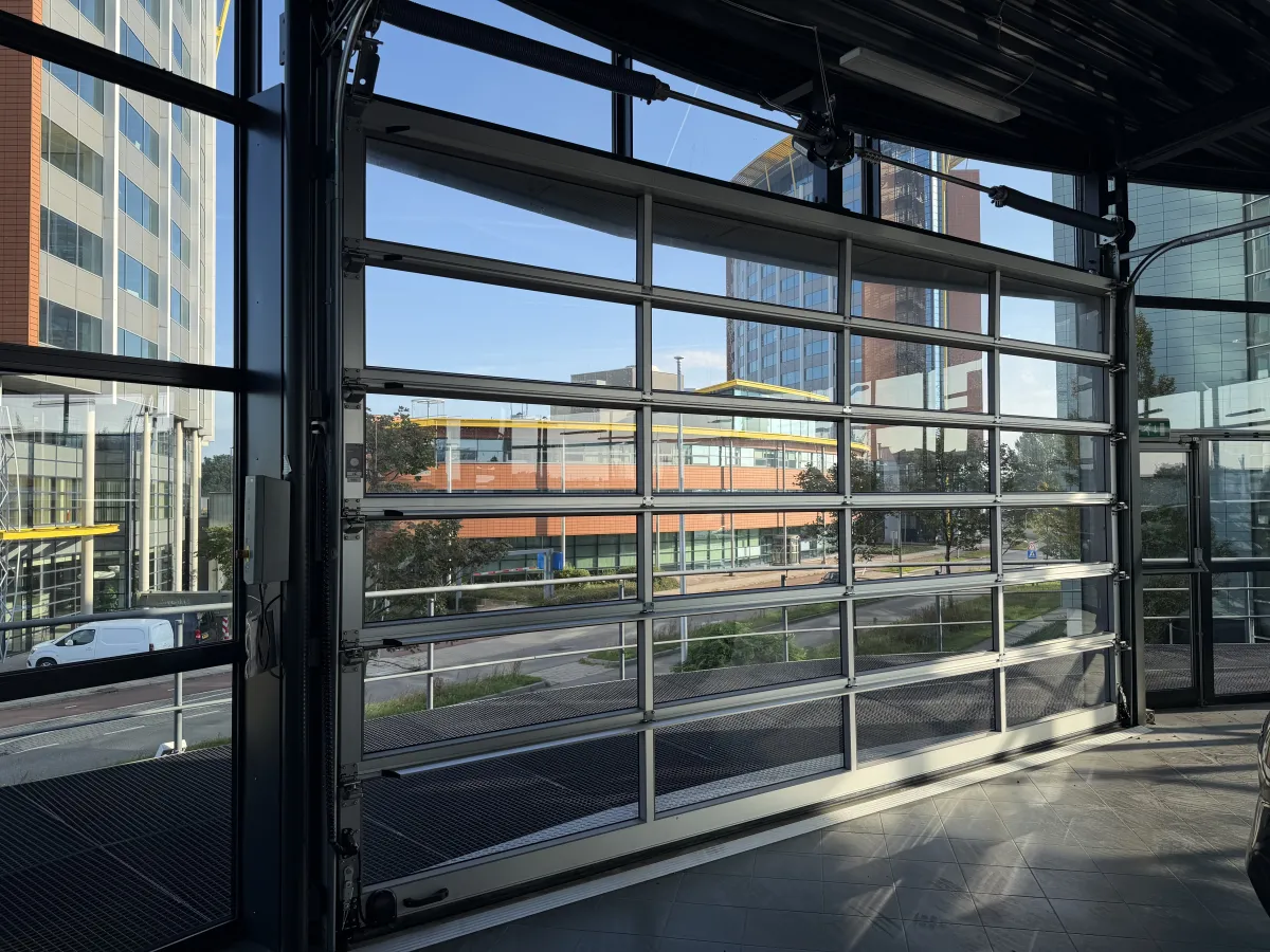 Steel Roof Structure with Corrugated Deck, LED Strip Lights & Glazed Curtain Wall Canopy