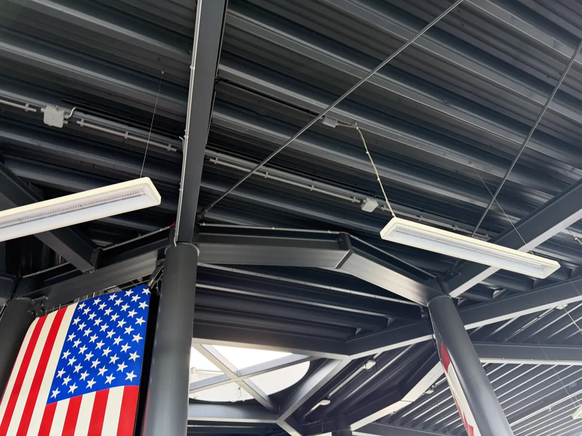Steel Roof Structure with Corrugated Deck, LED Strip Lights & Glazed Curtain Wall Canopy